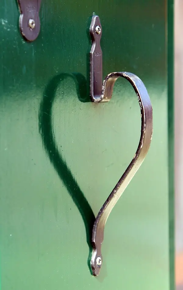 reflection of the door handle in the shape of heart